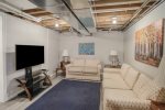 Relax in the Soft Seating and Binge Your Favorite Shows on the Flatscreen TV in the Lower Level Family Room